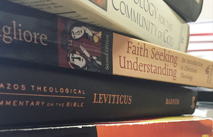 Stack of books for a Graduate Diploma in Biblical and Theological Studies